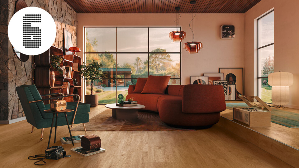 Vinylboden mit einem warmen, eleganten Cognac-Farbton unter einem roten Sofa und einem blauen Sessel